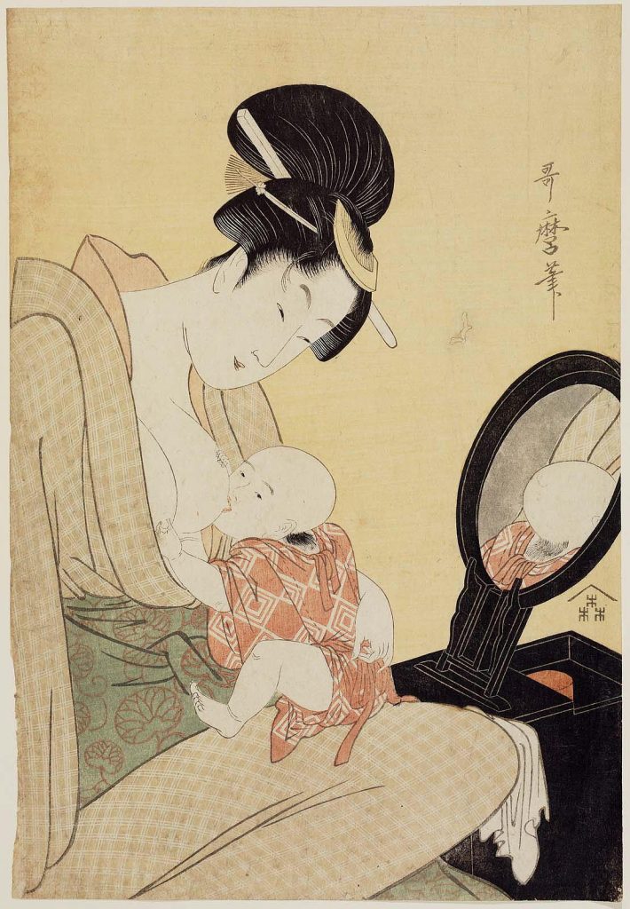 A mother breastfeeds her child in this vignette, before a desk mirror. Japanese writing is inscribed on the print.