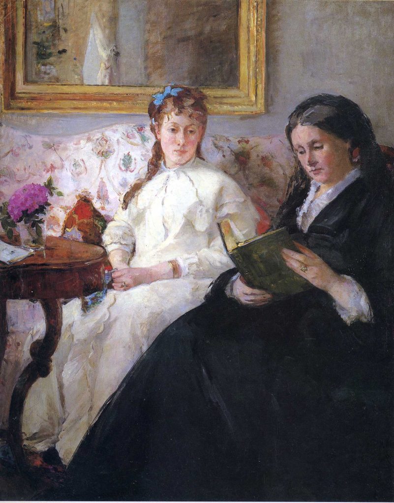 Resting on a couch are two women, one, older, in a black dress reads a book while the second, younger, sits iddly in a more vibrant white dress. Behind them, we see the bottom portion of a painting on the wall of the chamber.