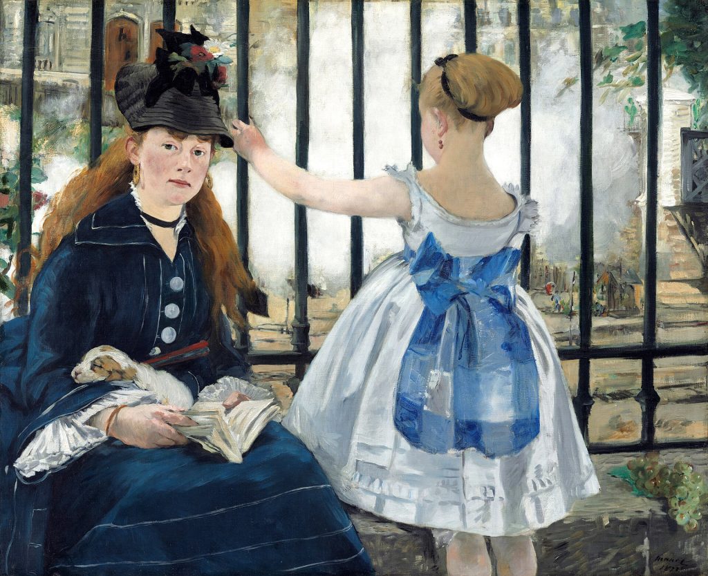 A woman and young girl, presumably her daughter, sit by a fenced railway. The former reads and peers forward, a puppy in her lap, while the young girl looks out to the tracks.