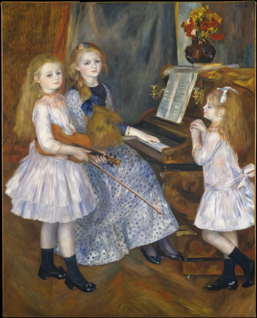 Three young girls lean over a piano, posed as pre-occupied. One, on the left, holds a violin.