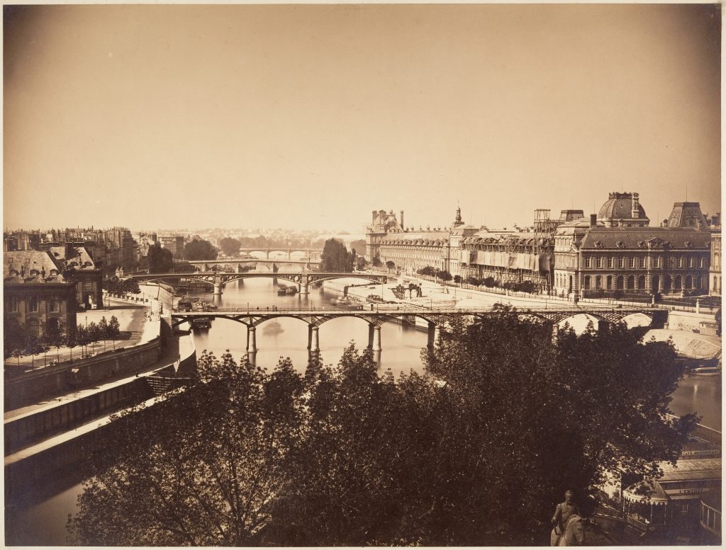 A slightly elevated panoramic view of the Seine, silver print photographed.