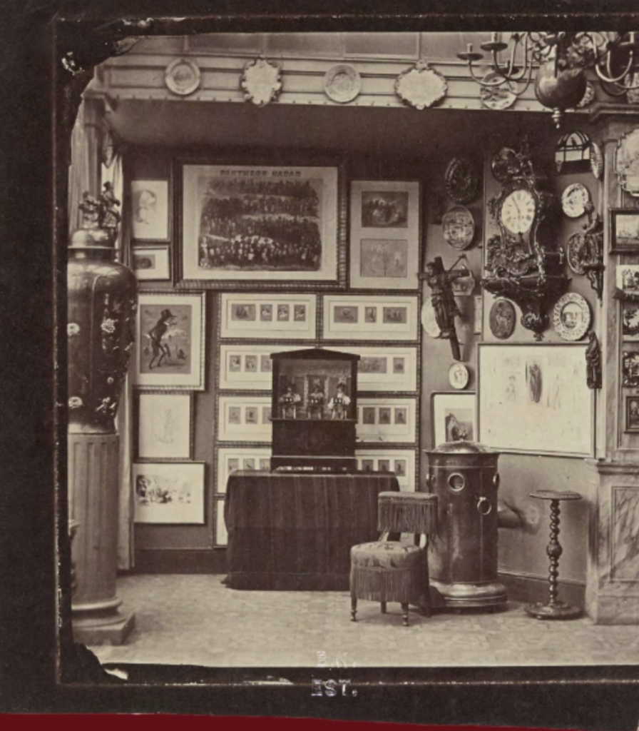 The interior of Nadar's studio is almost museum-like, walls covered with prints and artifacts.