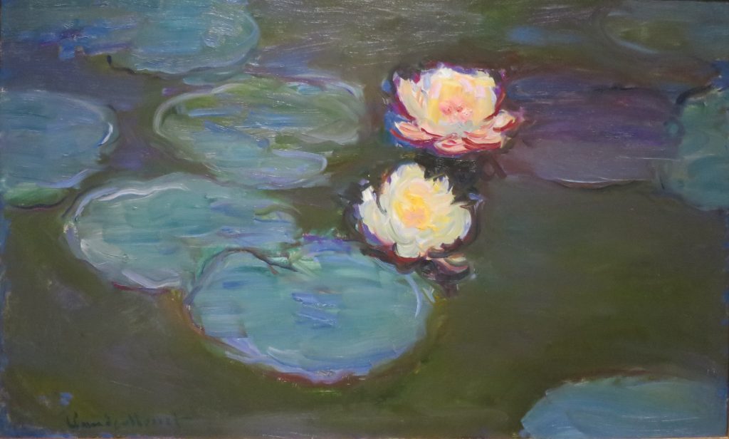 Melding water lilies give way to bright yellow flowers that distort the shades around them.
