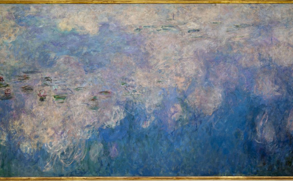 A flowing painting of white clouds reflected in a blue water lily pond.