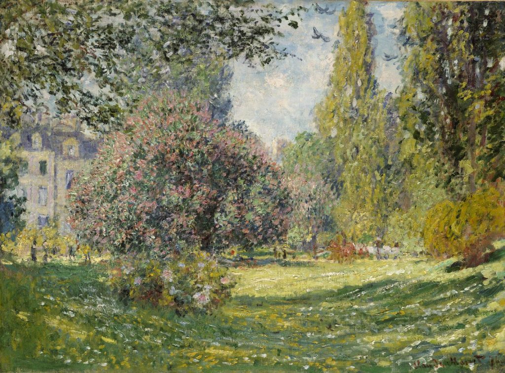 A vast and intricate landscape of this parc contains sporadic and detailed colouration in the foliage of the trees and bushes. A light shines between the trees.