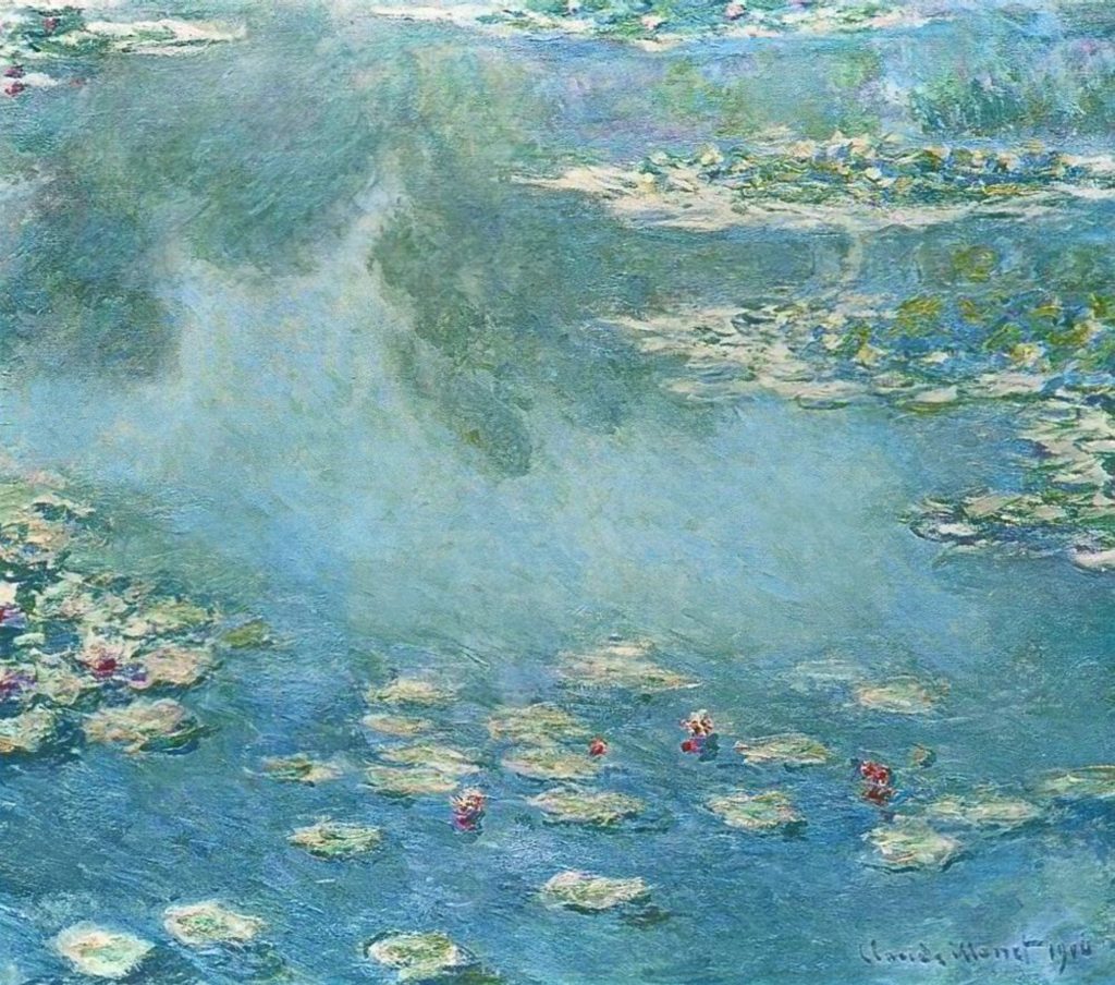 A lighter turquoise pond of water lilies, reflecting a tree-line.