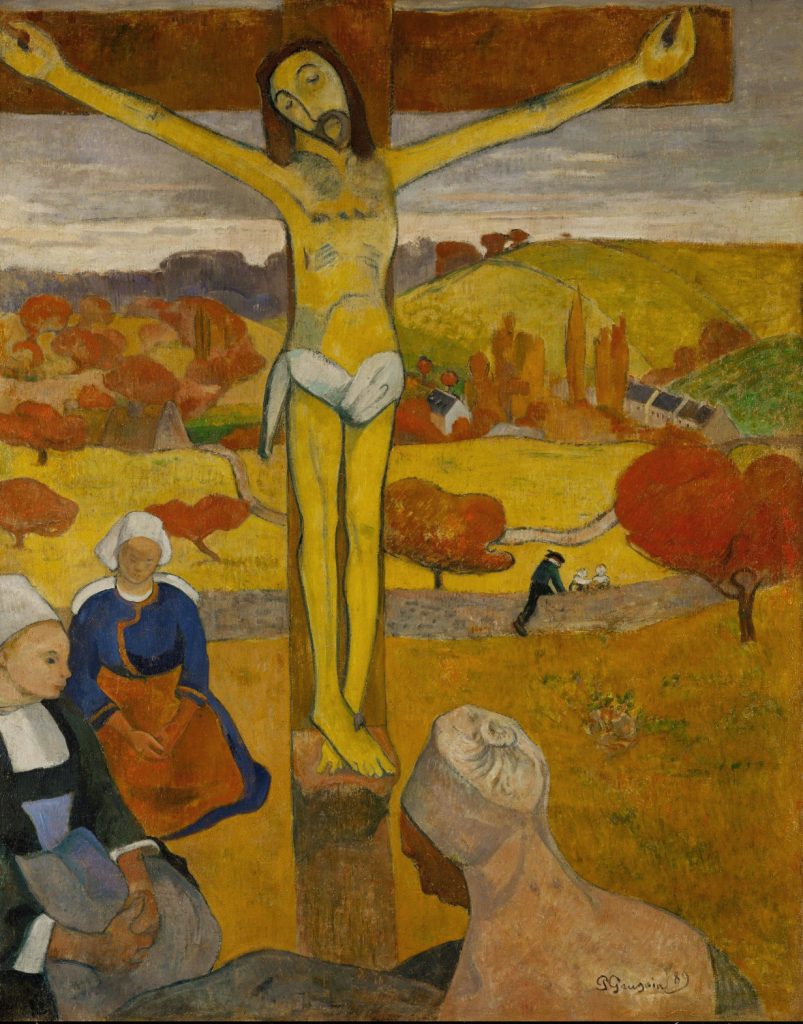 A yellow-tinted Christ on the cross is placed before a landscape of rolling hills and orange trees. Three women on their knees encircle him.