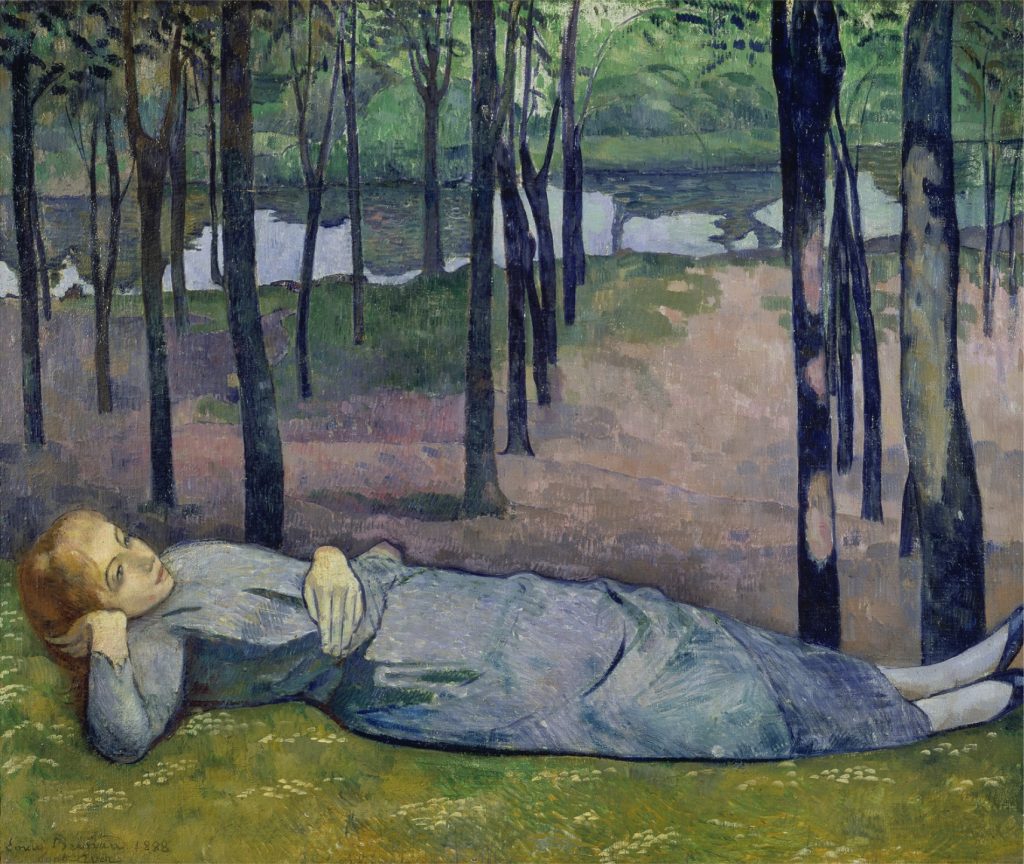 A reclining woman in a forest clearing, eyes upwards, rests by a river.