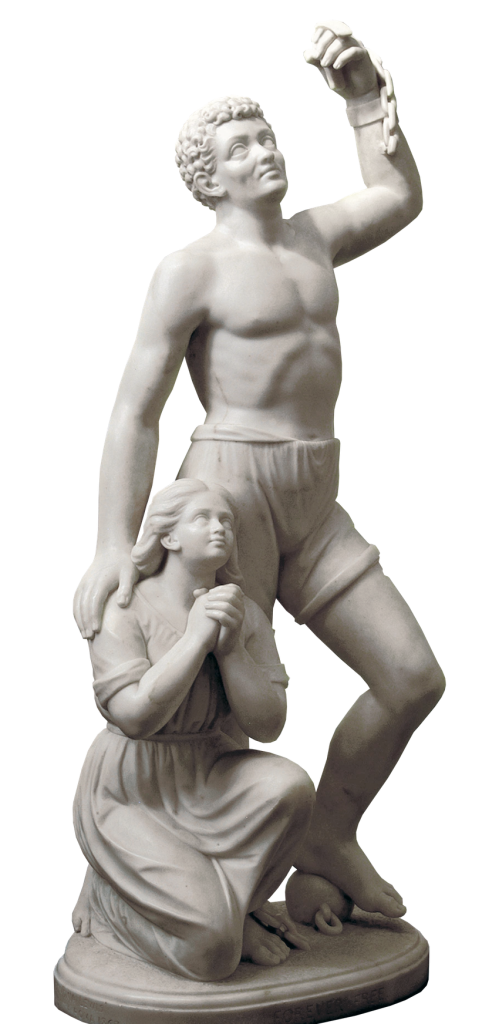 A marble sculpture of a freed slave, first clenching a chain and raised in the air. By his side is a kneeling woman, hands folded in prayer.