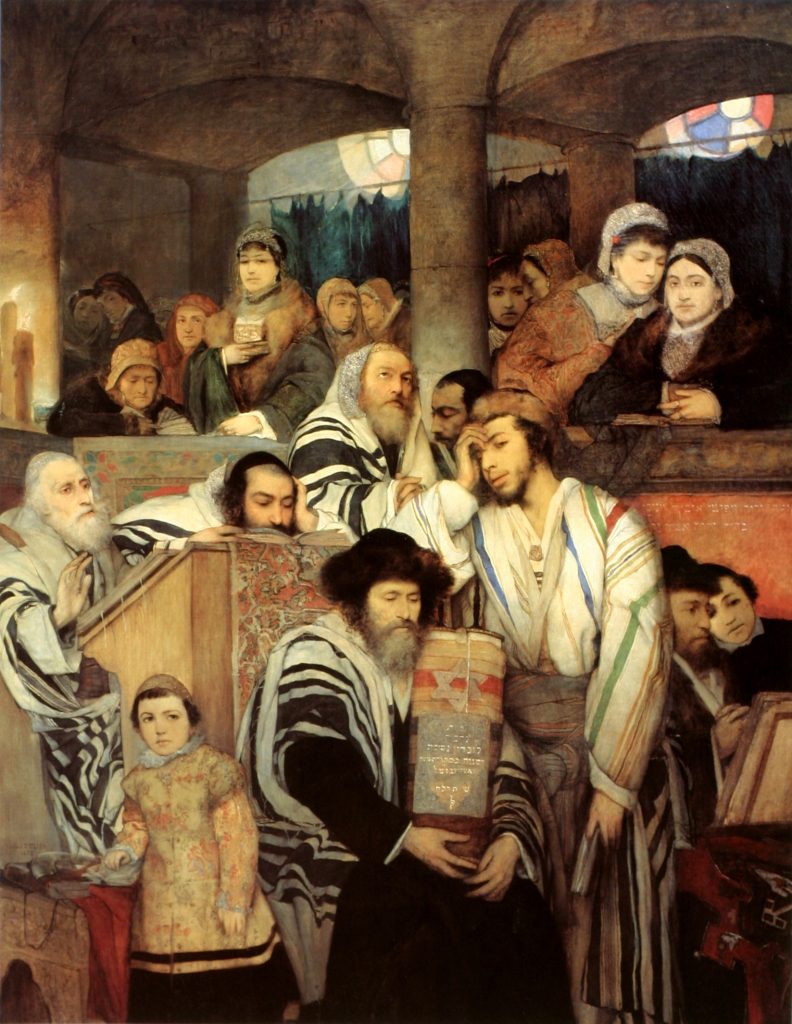 A series of jewish families, donned in religious clothing, focused on prayer. A central rabbi holds a Torah.
