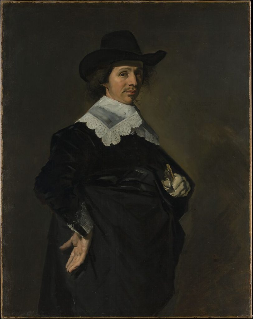 A portrait of a man in black robes, hand posed on his hip, turning slightly to look at the observer.