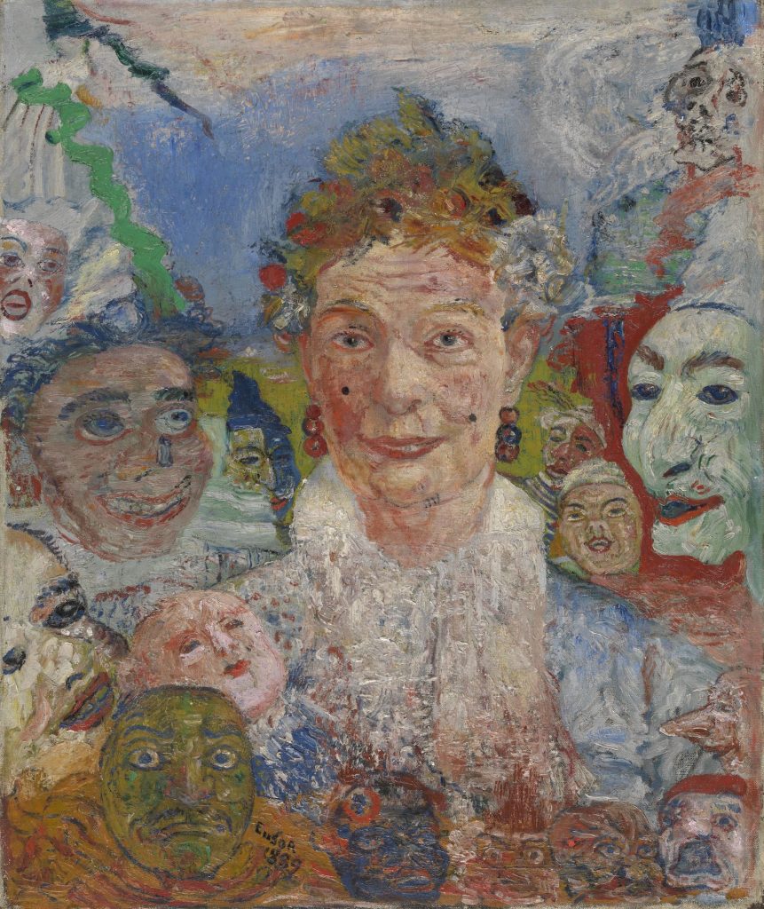 A heavily coiffed older woman's face is surrounded by various masks.